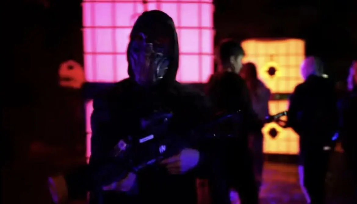 Team lasergame event in warehouse